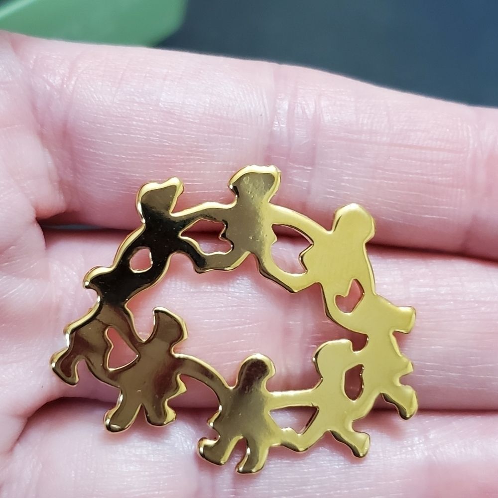 **Final Sale** Avon gold tone women of earth pin brooch